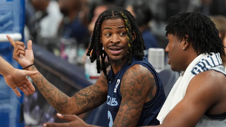Memphis Grizzlies guards Grizzlies' Ja Morant and GG Jackson II talk on the bench during practice at FedExForum.