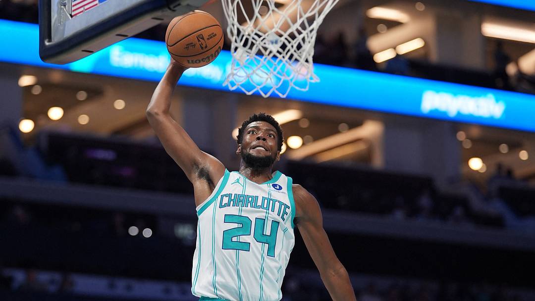 Oct 26, 2026; Charlotte, North Carolina, USA;  Charlotte Hornets forward Brandon Miller (24) dunks against the Washington Wizards during the first half at the Spectrum Center.  Mandatory Credit: Jim Dedmon-Imagn Images