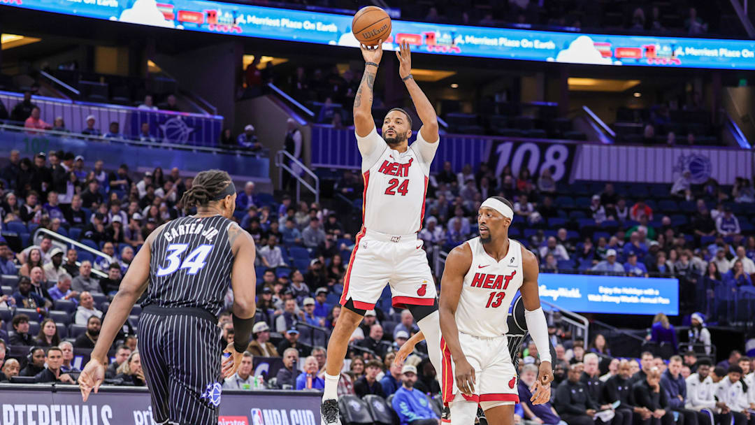 Dec 9, 2025; Orlando, Florida, USA; Miami Heat guard Norman Powell (24) shoots a three point basket during the first quarter against the Orlando Magic at Kia Center. Mandatory Credit: Mike Watters-Imagn Images Dec 9, 2025; Orlando, Florida, USA; Miami Heat guard Norman Powell (24) shoots a three point basket during the first quarter against the Orlando Magic at Kia Center. Mandatory Credit: Mike Watters-Imagn Images