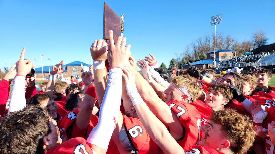 Peters Township players celebrate winning the 2023 WPIAL Class 5A title.