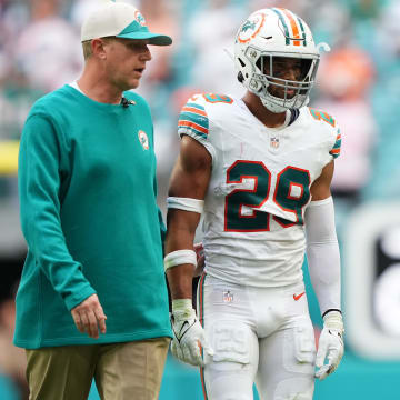 Oct 29, 2023; Miami Gardens, Florida, USA; Miami Dolphins safety Brandon Jones (29) leaves the game with a trainer after an apparent injury during the second half against the New England Patriots at Hard Rock Stadium. 