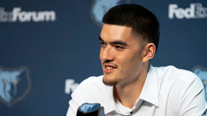 Zach Edey, a first-round draft pick for the Grizzlies, smiles during a press conference