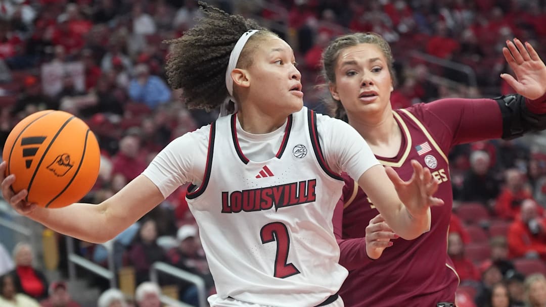 Louisville's guard Imari Berry (2) passes the ball against Florida State's forward Allie Kubek (0) in the KFC Yum! Center Sunday night.
Feb. 15, 2026