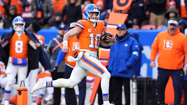 Jan 5, 2025; Denver, Colorado, USA; Denver Broncos quarterback Bo Nix (10) scrambles with the ball in the second quarter agai