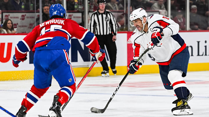Oct 21, 2023; Montreal, Quebec, CAN; Washington Capitals left wing Alex Ovechkin (8) shoots the puck against the Montreal Canadiens during the third period at Bell Centre. Mandatory Credit: David Kirouac-Imagn Images