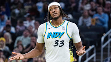 Nov 24, 2024; Indianapolis, Indiana, USA; Indiana Pacers center Myles Turner (33) celebrates a made basket  in the first half against the Washington Wizards at Gainbridge Fieldhouse. Mandatory Credit: Trevor Ruszkowski-Imagn Images