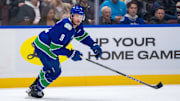 Nov 12, 2024; Vancouver, British Columbia, CAN; Vancouver Canucks forward J.T. Miller (9) skates against the Calgary Flames during the first period at Rogers Arena. Mandatory Credit: Bob Frid-Imagn Images