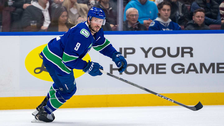 Nov 12, 2024; Vancouver, British Columbia, CAN; Vancouver Canucks forward J.T. Miller (9) skates against the Calgary Flames during the first period at Rogers Arena. Mandatory Credit: Bob Frid-Imagn Images