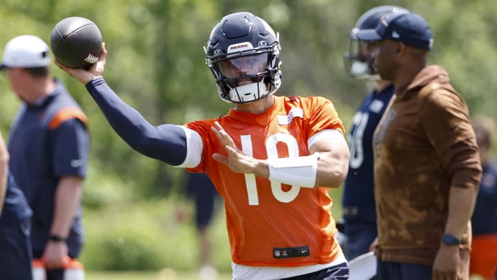 Bears quarterback Caleb Williams throws the ball during organized team activities at Halas Hall.