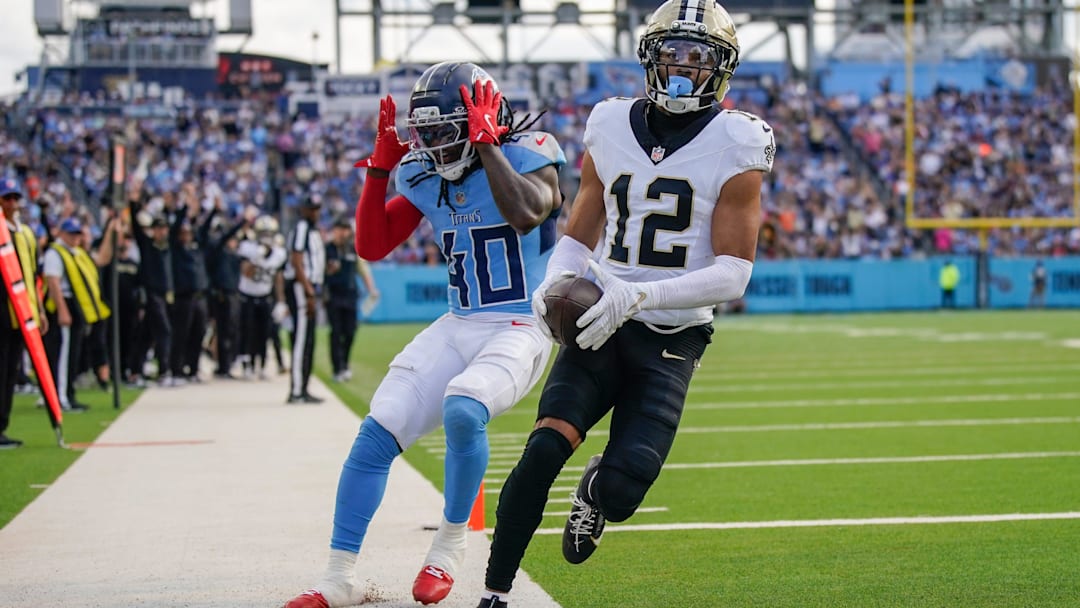 Tennessee Titans cornerback Kemon Hall (40) reacts to New Orleans Saints wide receiver Chris Olave (12) running in a touchdown during the third quarter at Nissan Stadium in Nashville, Tenn., Sunday, Dec. 28, 2025.