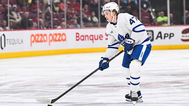 Sep 30, 2023; Montreal, Quebec, CAN; Toronto Maple Leafs defenseman Topi Niemela (47) plays the puck against the Montreal Canadiens during the first period at Bell Centre. Mandatory Credit: David Kirouac-Imagn Images