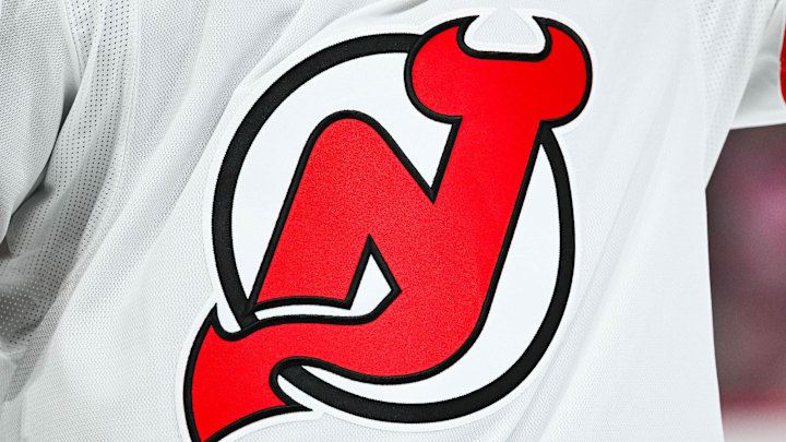 Feb 8, 2025; Montreal, Quebec, CAN; View of a New Jersey Devils logo on a jersey worn by a member of the team during the second period at Bell Centre. Mandatory Credit: David Kirouac-Imagn Images