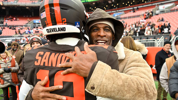 Cleveland Browns quarterback Shedeur Sanders with his father, Deion.