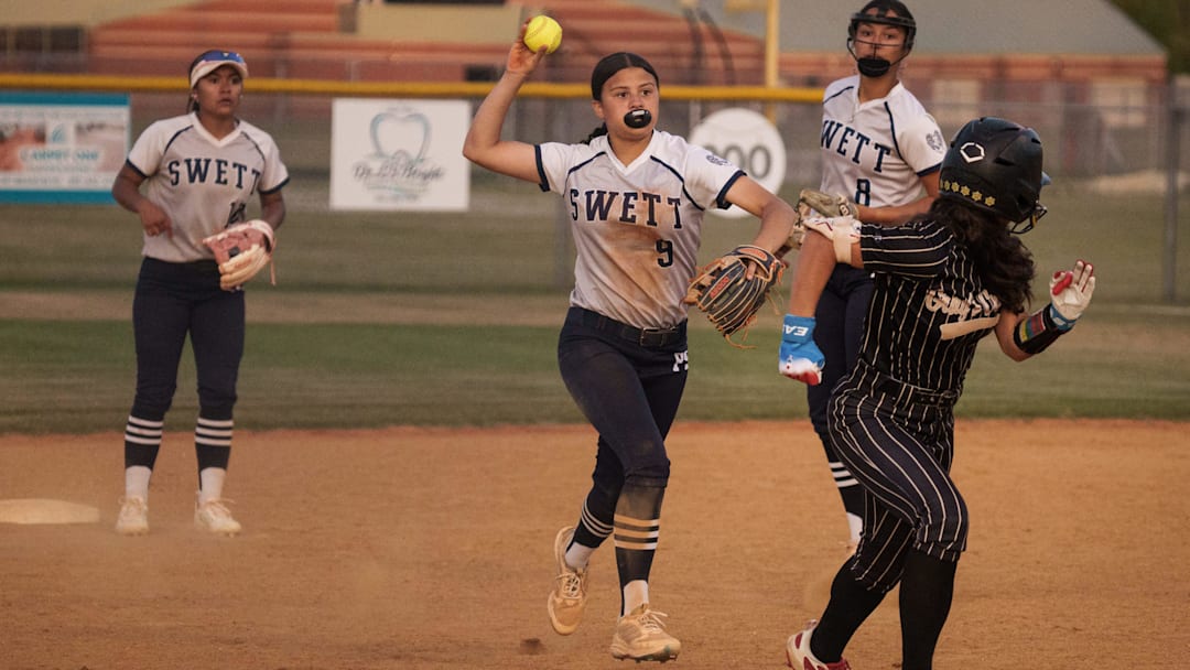Gray's Creek ’s Skylar Belote gets caught in a pickle with Purnell Swett’s Angel Chavis chasing her down during the third inning on Tuesday, April 21, 2026, at Gray's Creek High School.