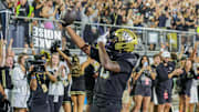 Nov 22, 2025; Orlando, Florida, USA; UCF Knights tight end Dylan Wade (0) reacts after scoring during the second half against the Oklahoma State Cowboys at Acrisure Bounce House. Mandatory Credit: Mike Watters-Imagn Images