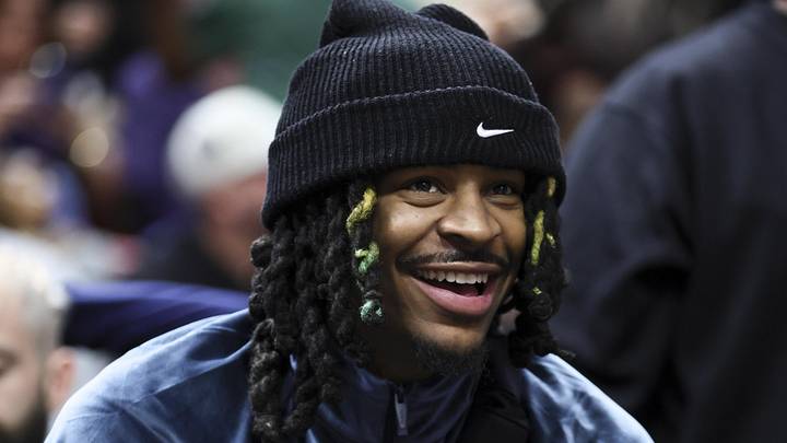 Jan 24, 2024; Miami, Florida, USA; Memphis Grizzlies guard Ja Morant (12) looks on from the beach against the Miami Heat during the third quarter at Kaseya Center. Mandatory Credit: Sam Navarro-USA TODAY Sports