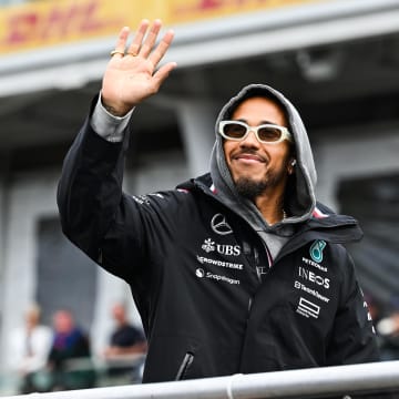 Jun 9, 2024; Montreal, Quebec, CAN; Mercedes driver Lewis Hamilton (GBR) salutes the crowd during the drivers parade of the Canadien Grand Prix at Circuit Gilles Villeneuve. Mandatory Credit: David Kirouac-USA TODAY Sports