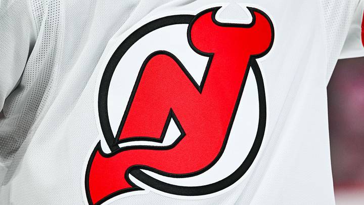 View of a New Jersey Devils logo on a jersey worn by a member of the team during the second period at Bell Centre. Mandatory Credit: David Kirouac-Imagn Images