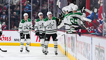 Nov 13, 2025; Montreal, Quebec, CAN; Dallas Stars defenseman Esa Lindell (23) celebrates with his teammates at the bench his goal against the Montreal Canadiens during the second period at Bell Centre. Mandatory Credit: David Kirouac-Imagn Images