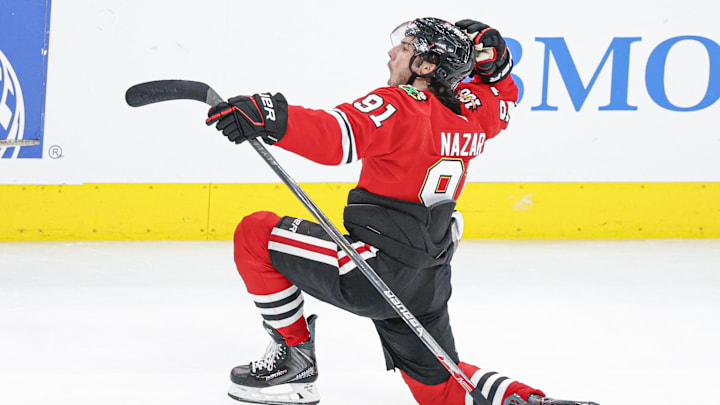 Mar 9, 2026; Chicago, Illinois, USA; Chicago Blackhawks center Frank Nazar (91) celebrates after scoring a game winning goal against the Utah Mammoth in overtime at United Center. Mandatory Credit: Kamil Krzaczynski-Imagn Images
