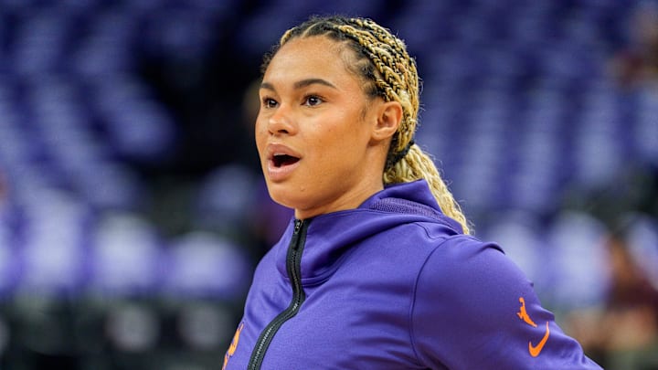 Phoenix Mercury forward Satou Sabally reacts as she shoots around during warmups.