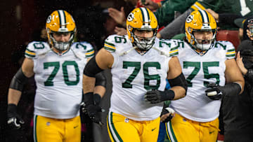January 20, 2024; Santa Clara, CA, USA; Green Bay Packers guard Royce Newman (70), guard Jon Runyan (76), and guard Sean Rhyan (75) before a 2024 NFC divisional round game against the San Francisco 49ers at Levi's Stadium. Mandatory Credit: Kyle Terada-Imagn Images