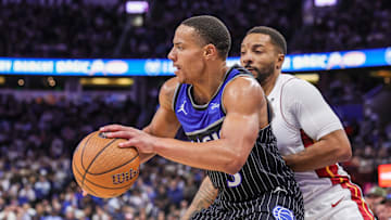 Dec 9, 2025; Orlando, Florida, USA; Orlando Magic guard Desmond Bane (3) drives to the basket against Miami Heat guard Norman Powell (24) during the second half at Kia Center. Mandatory Credit: Mike Watters-Imagn Images