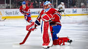 Apr 14, 2025; Montreal, Quebec, CAN; Montreal Canadiens goalie Jakub Dobes (75) kneels on the ice in warm-up before the game against the Chicago Blackhawks at Bell Centre. Mandatory Credit: David Kirouac-Imagn Images