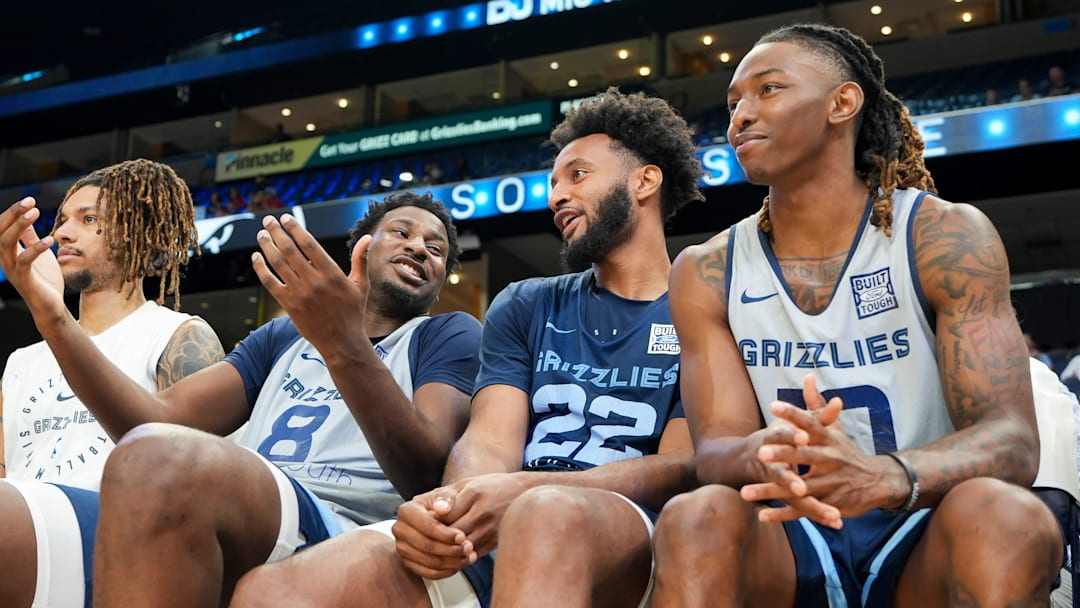 Grizzlies’ Jaren Jackson Jr. (8) talks with Braxton Key (22) and Javon Small (10) on the bench during open practice at the FedExForum on October 4, 2025, in Memphis, Tenn. Grizzlies’ Jaren Jackson Jr. (8) talks with Braxton Key (22) and Javon Small (10) on the bench during open practice at the FedExForum on October 4, 2025, in Memphis, Tenn.