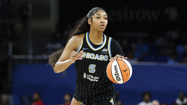 Chicago Sky forward Angel Reese (5) looks to pass the ball against the Las Vegas Aces.