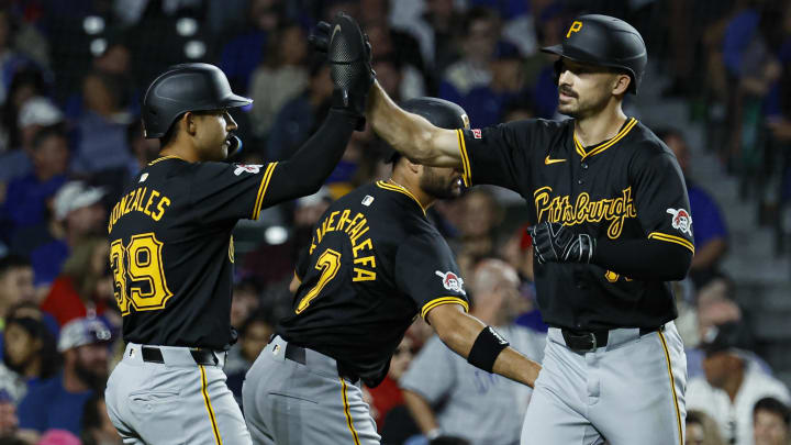 Sep 2, 2024; Chicago, Illinois, USA; Pittsburgh Pirates outfielder Bryan Reynolds celebrates with teammates at Wrigley Field.