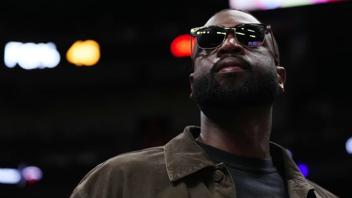 Jan 19, 2024; Miami, Florida, USA; Former Miami Heat player Dwayne Wade walks court-side during the second half of the game between the Miami Heat and the Atlanta Hawks at Kaseya Center. Mandatory Credit: Jasen Vinlove-USA TODAY Sports