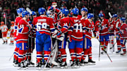 Dec 9, 2024; Montreal, Quebec, CAN; Montreal Canadiens players gather together to celebrate a win against the Anaheim Ducks after a shootout at Bell Centre. Mandatory Credit: David Kirouac-Imagn Images