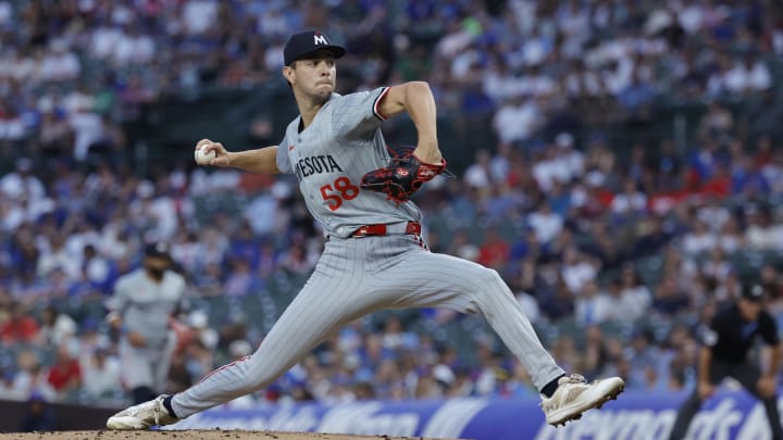 Aug 5, 2024; Chicago, Illinois, USA; Minnesota Twins starting pitcher David Festa (58) delivers a pitch against the Chicago Cubs during the first inning at Wrigley Field. Mandatory Credit: Kamil Krzaczynski-USA TODAY Sports