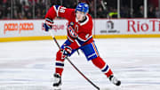 Dec 7, 2024; Montreal, Quebec, CAN; Montreal Canadiens defenseman Lane Hutson (48) plays the puck against the Washington Capitals during the second period at Bell Centre. Mandatory Credit: David Kirouac-Imagn Images