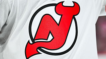 Feb 8, 2025; Montreal, Quebec, CAN; View of a New Jersey Devils logo on a jersey worn by a member of the team during the second period at Bell Centre. Mandatory Credit: David Kirouac-Imagn Images