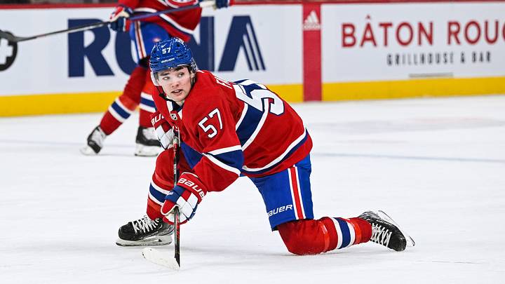 Mar 30, 2023; Montreal, Quebec, CAN; Montreal Canadiens center Sean Farrell (57) falls on the ice while tracking the play during the second period at Bell Centre. Mandatory Credit: David Kirouac-USA TODAY Sports