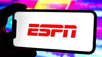 In this photo illustration, an ESPN logo is displayed on the...