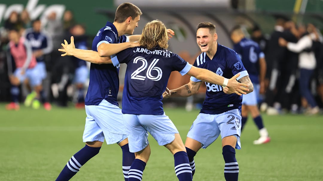 Vancouver Whitecaps celebrate qualifying to the 2021 MLS playoffs