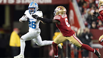 December 30, 2024; Santa Clara, California, USA; Detroit Lions running back Jahmyr Gibbs (26) runs against San Francisco 49ers safety Malik Mustapha (6) during the fourth quarter at Levi's Stadium. Mandatory Credit: Kyle Terada-Imagn Images