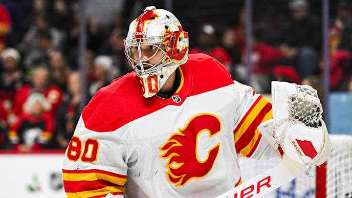 Nov 25, 2024; Ottawa, Ontario, CAN; Calgary Flames goalie Dan Vladar (80) looks on during warm-up before the game against the Ottawa Senators at Canadian Tire Centre. Mandatory Credit: David Kirouac-Imagn Images