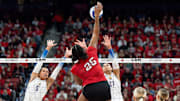 Louisville's Reese Robins (25) spiked the ball for a kill as the No. 3 Louisville Cardinals women's volleyball team faced off against the No. 1 Pitt Panthers on Wednesday, Nov. 27, 2024.