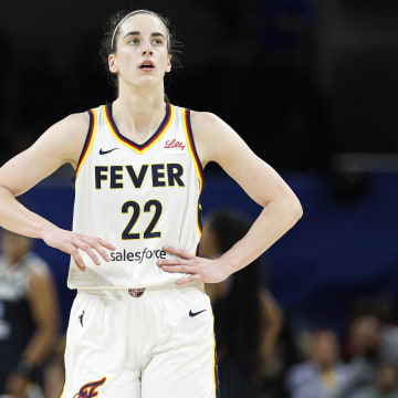 Jun 23, 2024; Chicago, Illinois, USA; Indiana Fever guard Caitlin Clark (22) walks on the court during the second half of a basketball game against the Chicago Sky at Wintrust Arena.