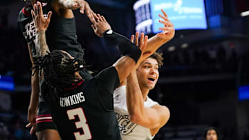 Cincinnati Bearcats guard Dan Skillings Jr. (0) passes the ball in the second half of a NCAA men’s basketball game between the Cincinnati Bearcats and Texas Tech Red Raiders, Tuesday, Jan. 21, 2025, at Fifth Third Arena in Cincinnati. Red Raiders won 81-71.