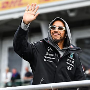 Jun 9, 2024; Montreal, Quebec, CAN; Mercedes driver Lewis Hamilton (GBR) salutes the crowd during the drivers parade of the Canadien Grand Prix at Circuit Gilles Villeneuve. Mandatory Credit: David Kirouac-Imagn Images