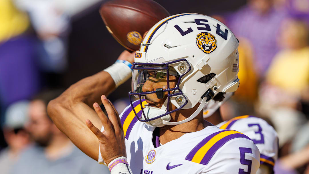 Nov 25, 2023; Baton Rouge, Louisiana, USA;  LSU Tigers quarterback Jayden Daniels (5) during throws during warmups.