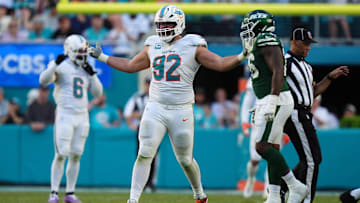 Miami Dolphins defensive tackle Zach Sieler (92) celebrates after sacking New York Jets quarterback Aaron Rodgers (8, not pictured) during the second half at Hard Rock Stadium.