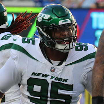 Quinnen Williams of the Jets reacts to a sack against the New York Giants at MetLife Stadium 