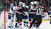 Feb 13, 2025; Montreal, Quebec, CAN; [Imagn Images direct customers only] Team Finland and Team USA players come together in the first period during a 4 Nations Face-Off ice hockey game at Bell Centre. Mandatory Credit: David Kirouac-Imagn Images