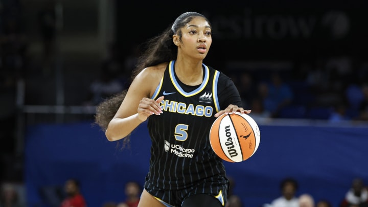 Chicago Sky forward Angel Reese (5) looks to pass the ball against the Las Vegas Aces during the first half at Wintrust Arena.